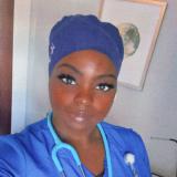 Santario Washington CRCP graduate in her nursing scrubs