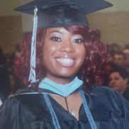 Thonequea Easley - CRCP graduate in her graduation gown on graduation day 